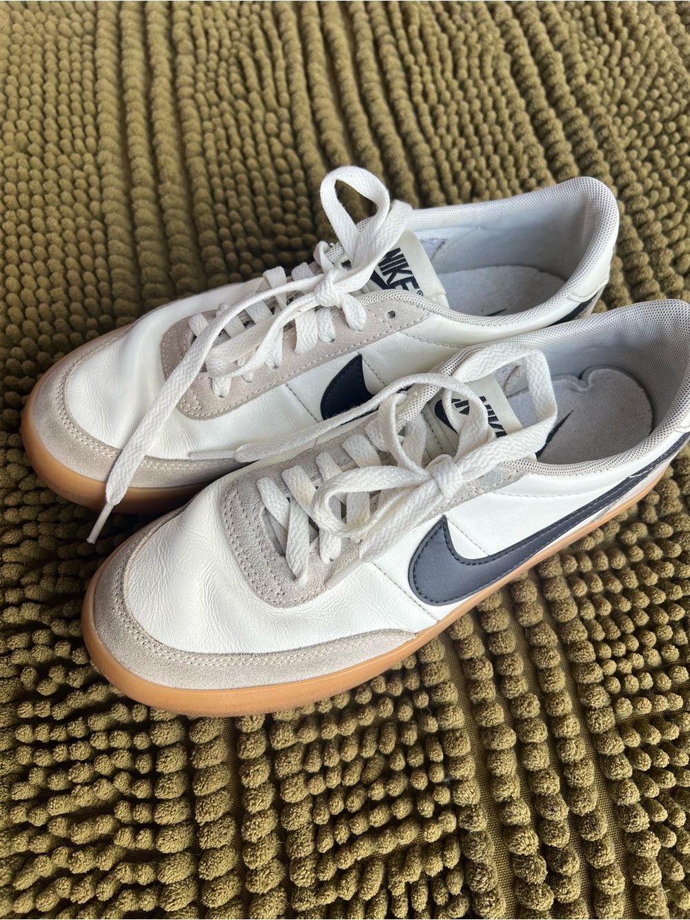 Nike women’s White Leather Sneakers with Navy Swoosh and Gum Sole